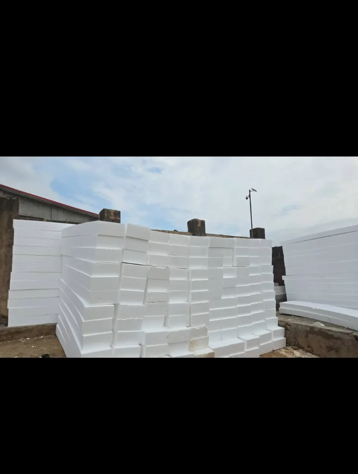 Stacked building insulation products in warehouse storage