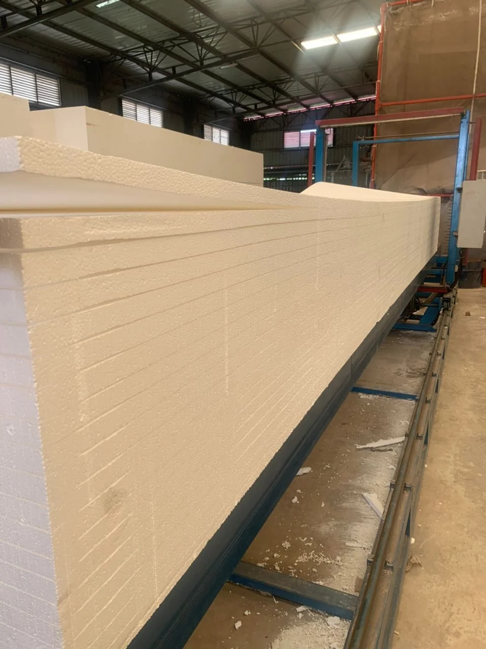 Stacks of white polystyrene insulation boards ready for distribution